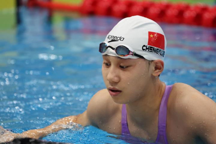 女子100米自由泳预赛，中国队杨浚瑄、程玉洁进入决赛（组图）(9)